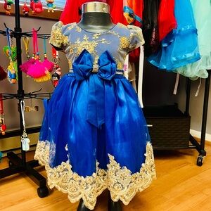 Elegant Blue and Gold Dress with Bow